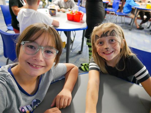 Students learning and having fun in Library.